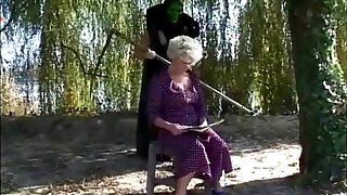 Granny gets a  lesson from masked man